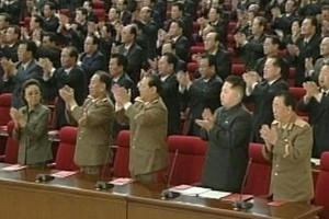 Kim Jong Un (front row, 2nd R), third song of Kim Jong Il, claps during the recent delegates meeting of the Worker's Party Korea. Photo: Reuters