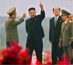 Kim Jong Un during the ceremony to unveil the statues of Kim Il Sung and Kim Jong Il on Mansu Hill in Pyongyang, on April 13, 2012. (Korean Central Television Evening News)