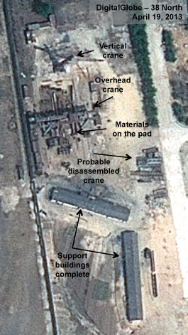 Figure 13. Several materials on the pad. Yongbyon 041913 - Transshipment Yard