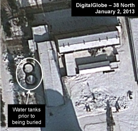 Figure 4. Water tanks placed by the spent fuel storage building. Yongbyon 010213 - Spent Fuel Storage Facility