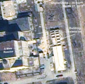 Figure 6. Building extension construction underway. Yongbyon 032713 - 5 MWe Reactor