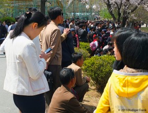 Cell phones are becoming more of a common site in North Korean cities. (Photo: Ruediger Frank)