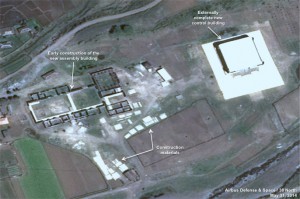 Figure 2. The externally complete new control building and early construction of the new assembly building.