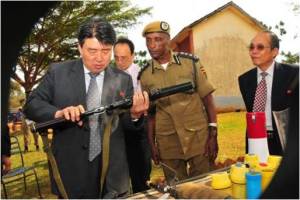 A gun of strikingly similar design to one shown on the Gafat brochure was photographed in the hands of North Korea’s People’s Security Minister while on a 2013 visit to Uganda. Photo: AFP. 