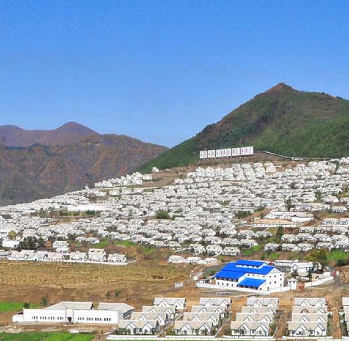 A ground photograph, looking north, at the workers’ village of Hoha-ri. (Photo: Korea)