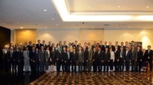 Officials and members of the China-led AIIB pose for a picture during the recent meeting held in Singapore. Photo: AIIB