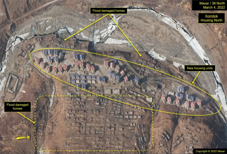 Figure 15b. New housing at Komdok housing North seems complete by 2022, but older flood damaged housing remains and no flood mitigation measures are observed. Copyright © 2022 Maxar.