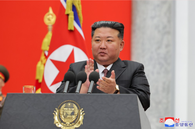 Kim Jong Un clapping during speech to the Defense Ministry.